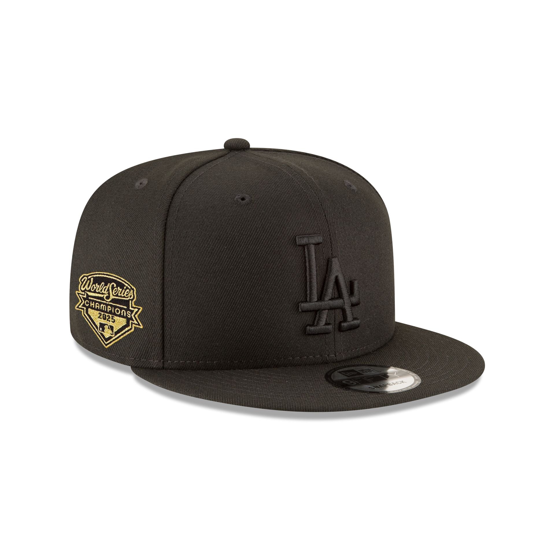 14943678_9FIFTY_MLBBASICSNAP950LOSDODBLKBLKWSC25MG_LOSDOD_BLK_3QR Los Angeles Dodgers 2025 World Series Champions Black on Black 9FIFTY Snapback Hat - Image 1